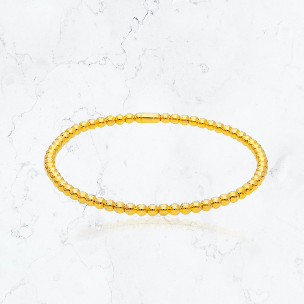 pulsera oro amarillo elasticada