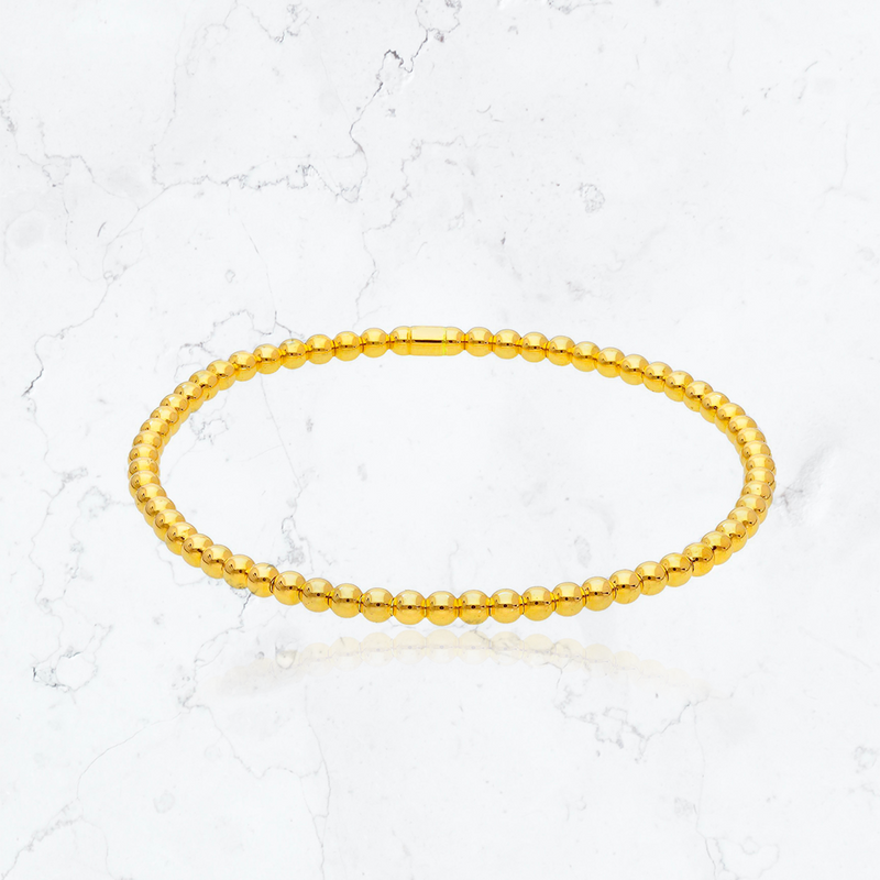 pulsera oro amarillo elasticada