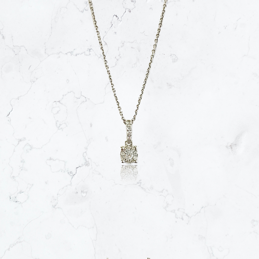collar punto de luz en oro blanco de 18K